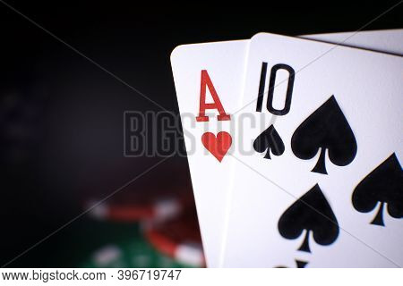 Poker Playing Chips With Cards Close Up Against The Back Background. . Online Gambling. Addiction. F