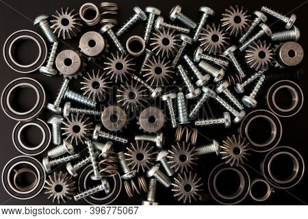 Background With Mechanical Components, Gears, Springs, Screws, Industrial Objects