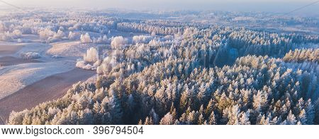 Aerial View From Above Of A Countryside Landscape With Beautiful Sunset Light On A Winter Evening Wi