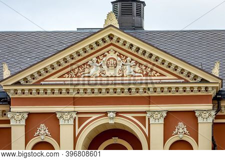 Klaipeda, Lithuania - July 10, 2020: Ornate Pediment Above The Entrance Of The Drama Theatre In Klai