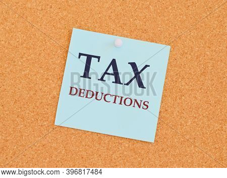 Writing Text Showing Tax Deductions. Business Concept For Finance Incoming Tax Money Deduction Writt