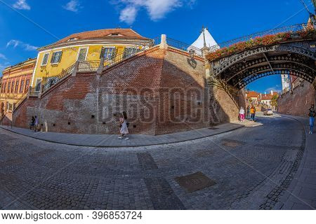 Sibiu, Romania - July 8, 2020: View To The Bridge Of Lies, The First Cast Iron Bridge Built In Roman
