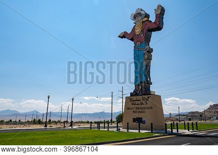West Wendover, Nevada - August 5, 2020: Famous Wendover Will Cowboy Statue Against A Blue Sky