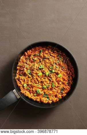 Keema Curry In Frying Pan Over Dark Background With Copy Space. Indian And Pakistani Style Dish. Top