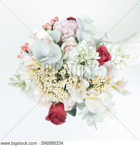 Delicate Wedding Bouquet In Pastel Shades From Artificial Flowers Top View Close-up. A Spare Bridal 
