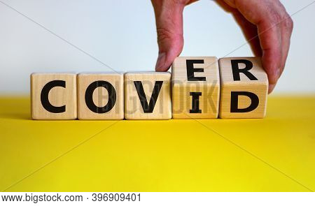 Cover Covid. Male Hand Turns Cubes With Words 'cover Covid'. Covid-19 Postpandemic Concept. Beautifu