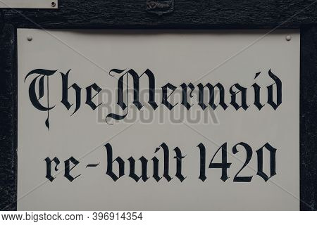 Rye, Uk - October 10, 2020: Sign Outside The Mermaid Inn, A Historic Hotel In Rye With Cellars Datin