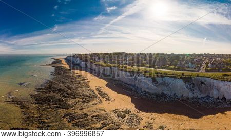 Drone aerial view of the beach and white cliffs on sunny day, Margate, England, UK