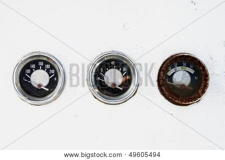 three rusty blank vintage guages with clipping path on white