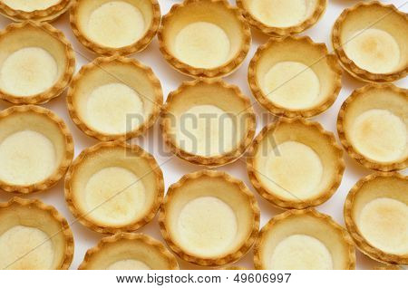 closeup of a pile of empty tartlets