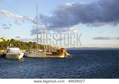 sailboats on sundown