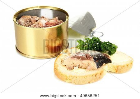 Open tin can and tasty sandwich with scomber, isolated on white