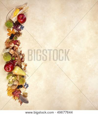 Autumn fruits leaves and nuts on jute
