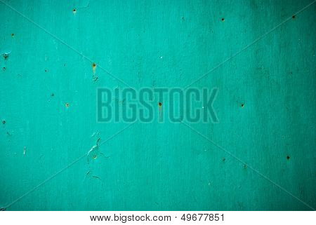 Old Cracked Painted Texture. Rusty Green Wood.