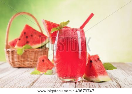 Fresh water melon drink on wood