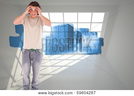 Embarressed brunette man against abstract screen in room showing server towers