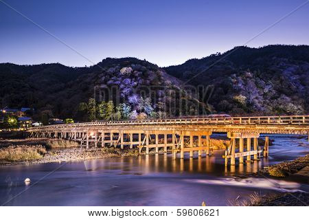 Arashiyama, Kyoto, Japan at Togetsukyo Bridge during the annual autumn light up.