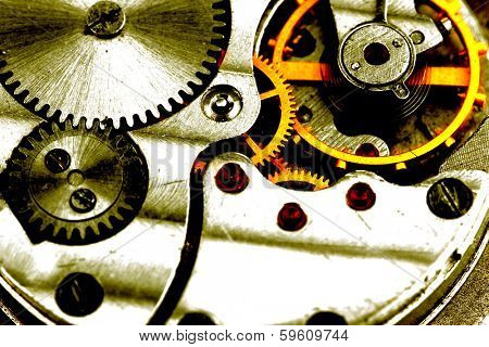 Clockwork details, pinions and wheels closeup