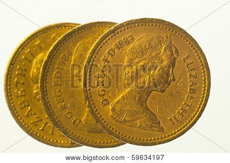 Three one pound coins