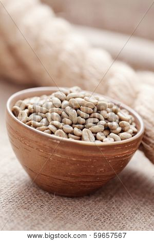 bowl of unroasted coffee beans - coffee time