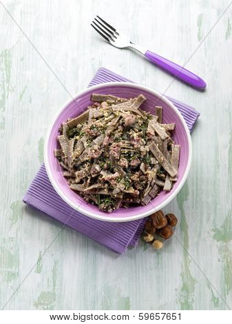 pizzocheri with sausage spinach and hazelnut