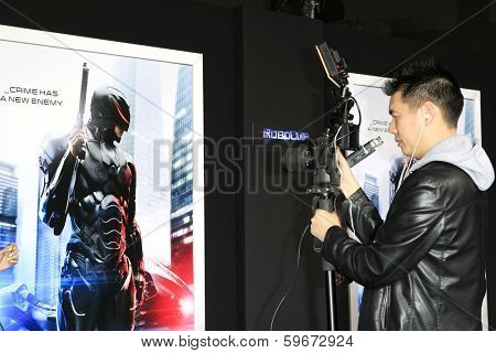 LOS ANGELES - FEB 10: Atmosphere, Poster, at the premiere of Columbia Pictures' 'Robocop' at TCL Chinese Theatre on February 10, 2014 in Los Angeles, California