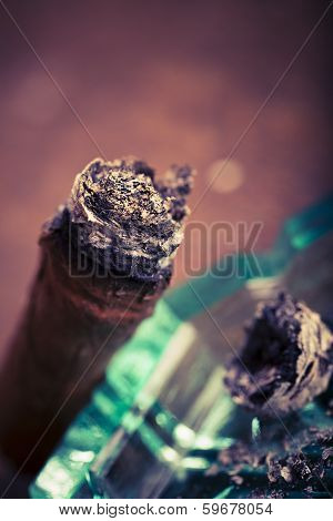 Expensive Hand-rolled Cigar On A While Background