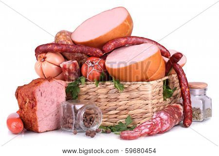 Lot of different sausages in basket isolated on white