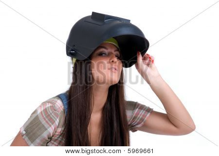 Woman in black welder mask