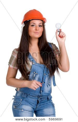 Woman in orange helmet holding ligh bulb