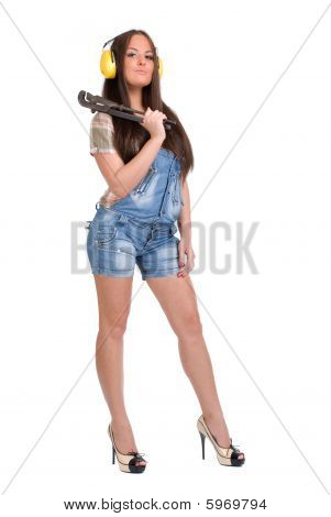 Woman holding big wrench