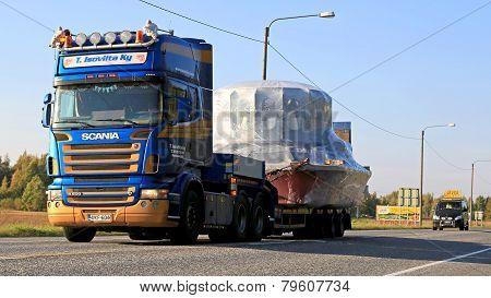 Scania R500 Hauls Wide Load Accompanied By An Escort Car