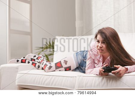 Pretty Girl Playing Videogames At Home