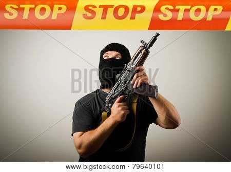 Man With Gun And Stop Line.