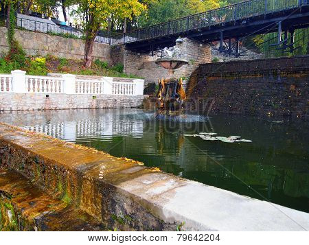 Old Fountain With Swans