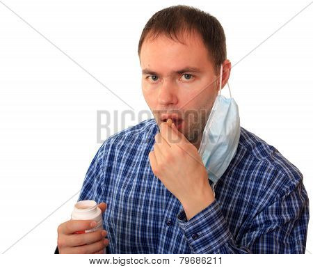 A man accepts vitamins.