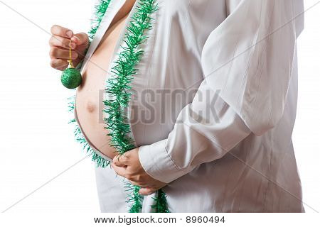 Barriga de mulher com as decorações de Natal