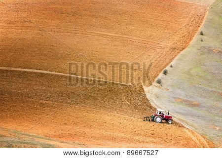 Tractor Plowing A Field
