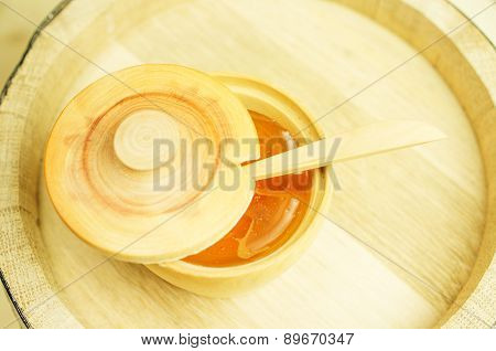 Honey In A Wooden Bowl