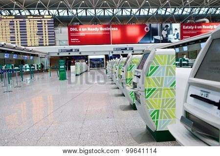 ROME, ITALY - AUGUST 04, 2015: self check-in kisosk in airport of Rome. Fiumicino Airport, is a major international airport in Rome, Italy