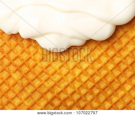 Soft ice cream over waffle texture closeup