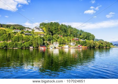 Meadows And Village On Hardanger Fiord.