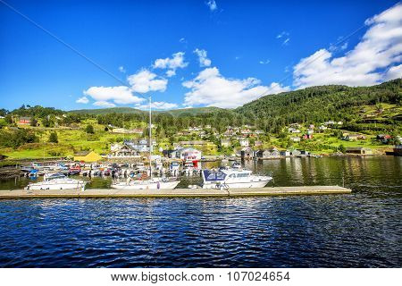 Meadows And Village On Hardanger Fiord.