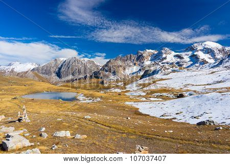 High Altitude Blue Alpine Lake In Autumn Season