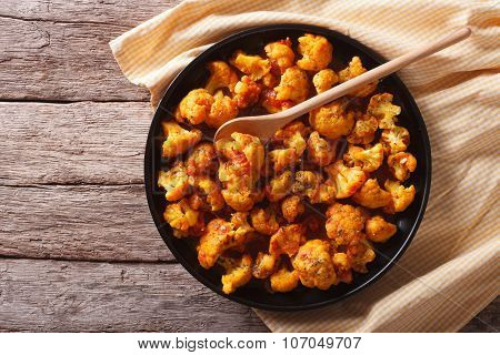 Cauliflower With Tomatoes In Curry. Horizontal Top View