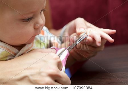 Mother Tonsured Nails Of Her Son