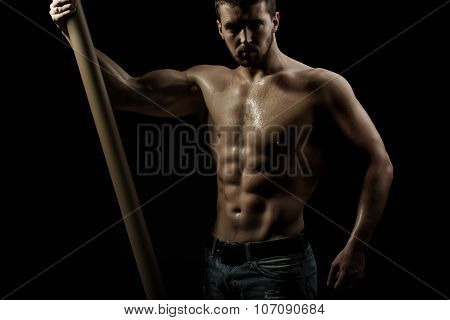 Muscular Man With Crossbar