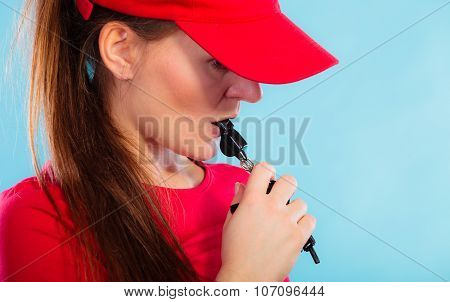 Lifeguard On Duty Blowing A Whistle
