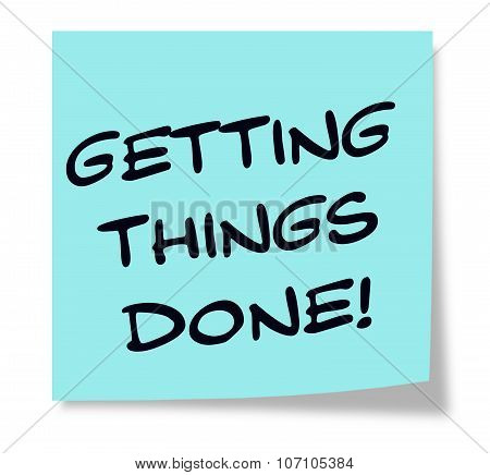 Getting Things Done Written On A Blue Sticky Note