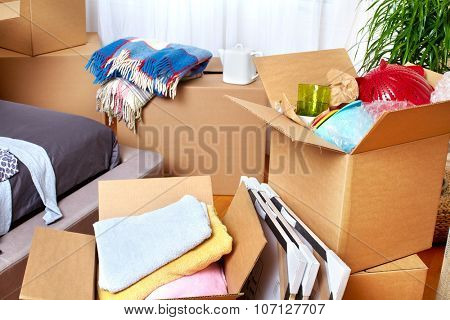 Moving boxes in new apartment. Real estate concept.